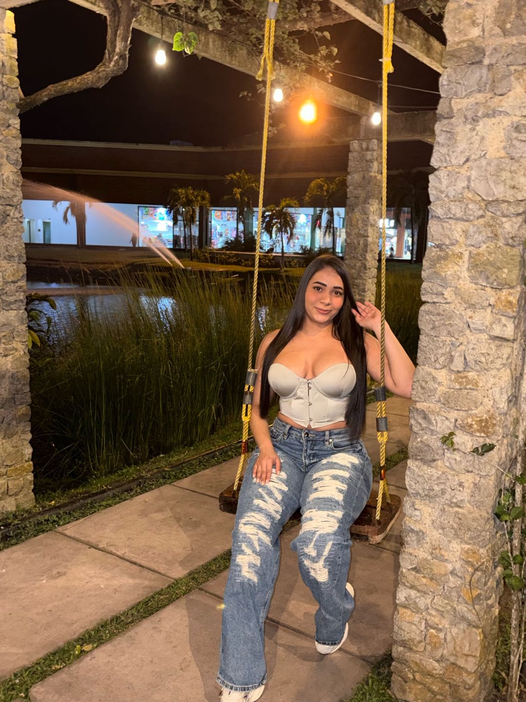 Girl waving hello on a cam to cam chat